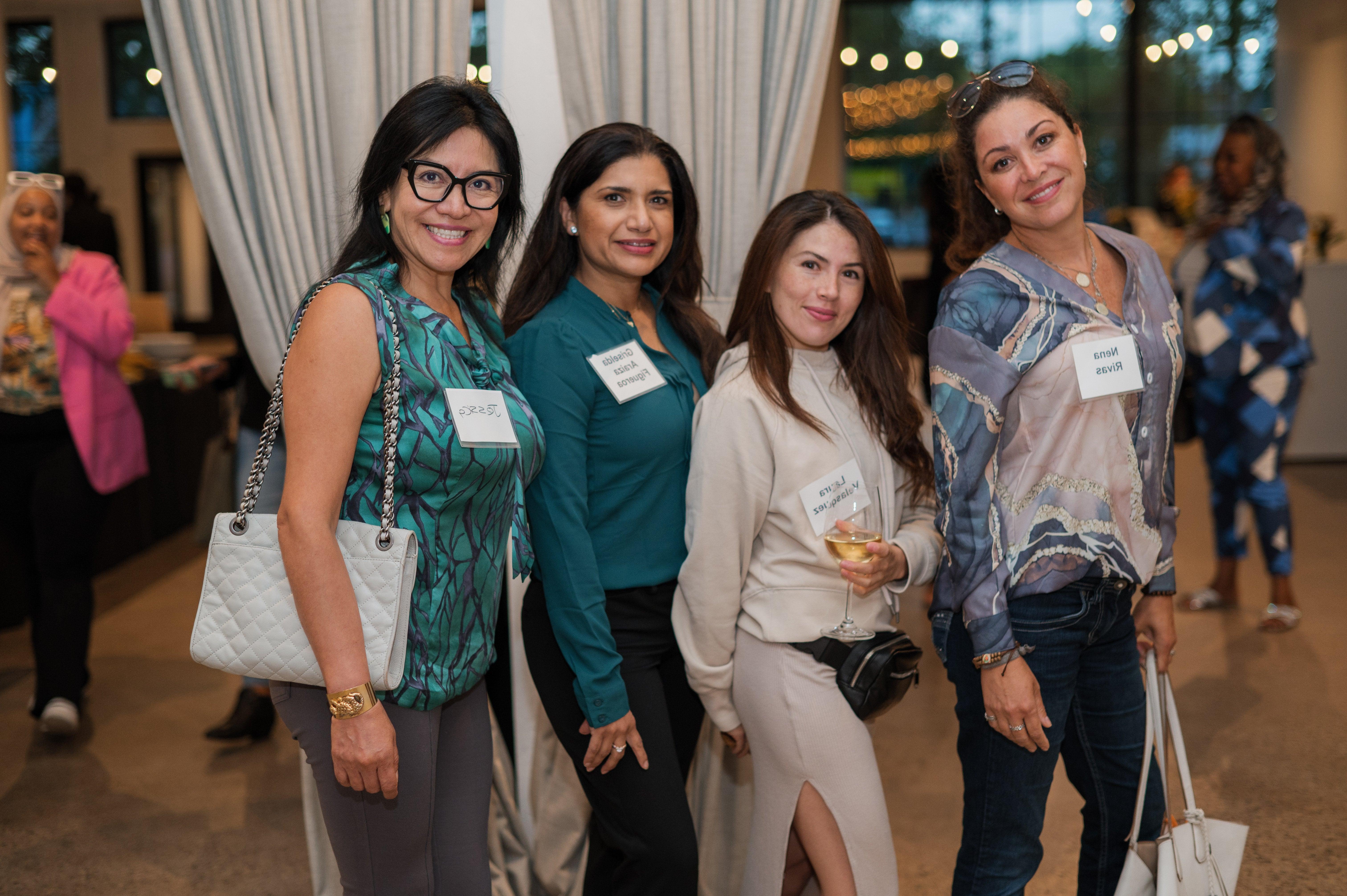 Group of 5 women posing at the Power of the Female Entrepreneur Event